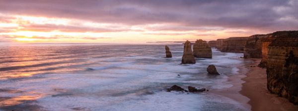 Victorian Coastline brown rock formations at sunset