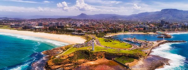 aerial view of headland and coastline of Wollongong, NSW on a sunny day