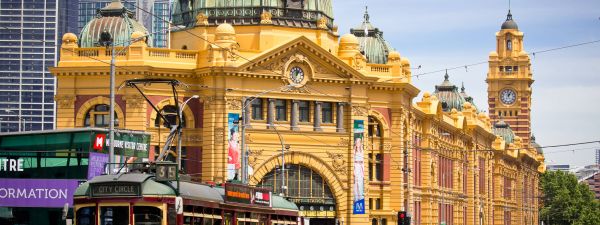 Melbourne Flinders street station as city tram passes by
