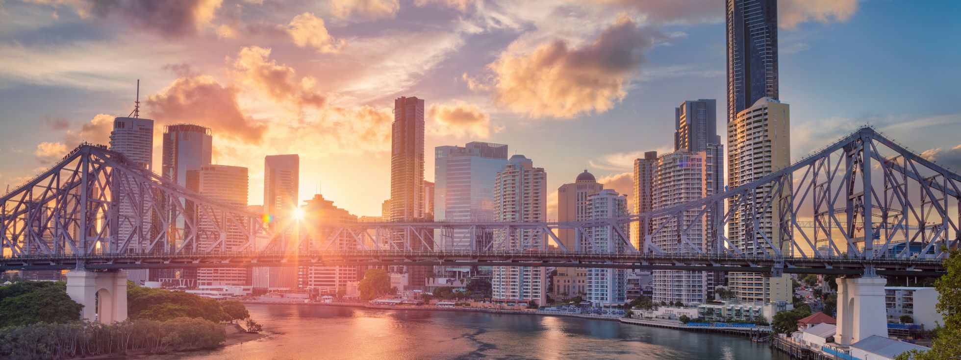 Brisbane skyline cityscape with Story bridge during sunset
