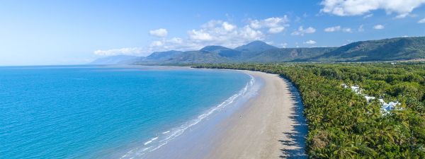 Enjoy 4 mile beach in Port Douglas with a Port Douglas escort